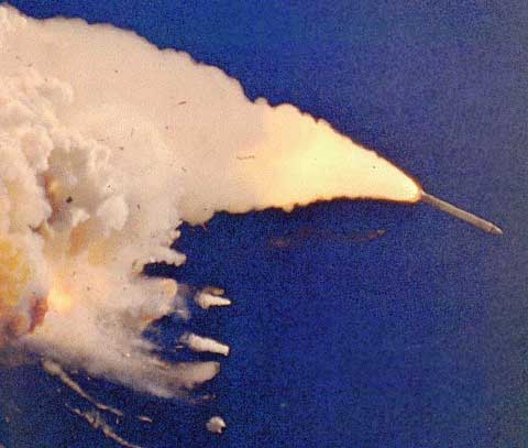 Immediately after the explosion, the SRBs are flying away.